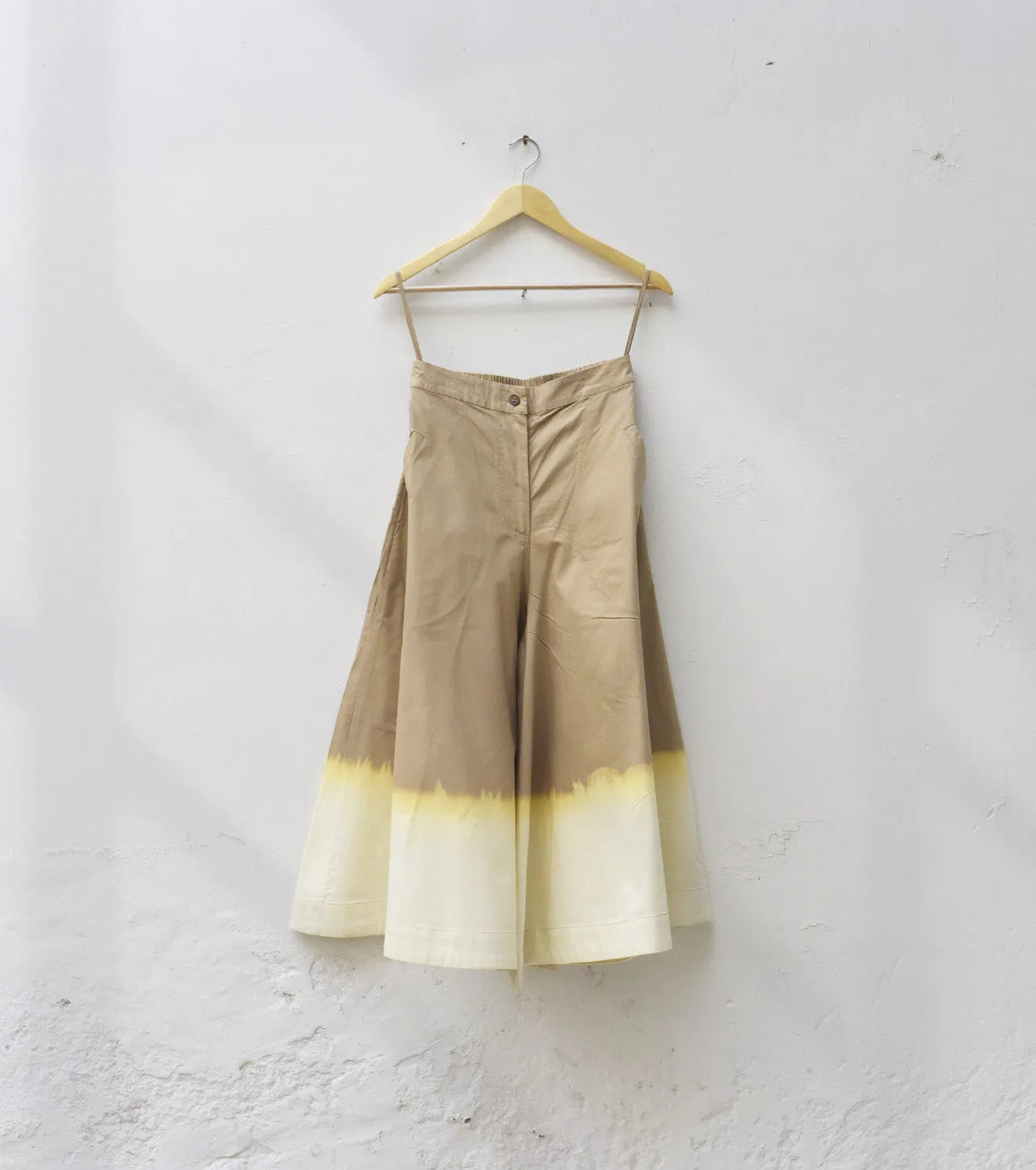 Ivory dip flare pants - Khara Kapas
