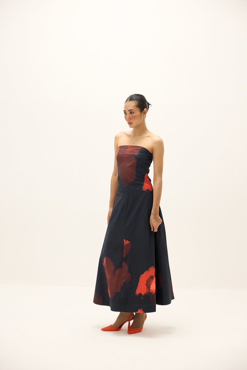 Khara Kapas Nubra strapless Oxford cotton midi dress with ruby-red floral print, fitted bodice and flared skirt