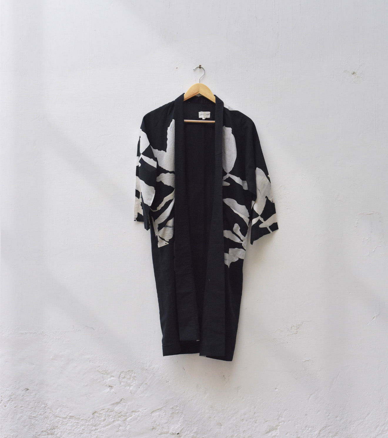 Black tree shrug